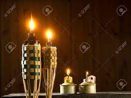 Oil lamps known as pelita or panjut are lit during the days before hari raya to attract spirits and angels to. Bamboo Torch And Oil Lamp Or Pelita Icon Of Hari Raya Stock Photo Picture And Royalty Free Image Image 144326225