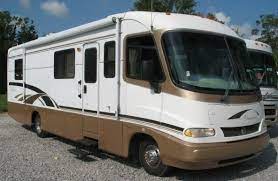 Spacious bathroom master suite dishwasher four tvs 67 sofa sleeper washer/dryer the holiday rambler admiral class a gas motorhome 28a highlights: Used 1998 Holiday Rambler Vacationer 32cg Overview Berryland Campers