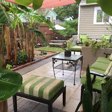 Backyard diy small patio makeovers patio with a lush border ideas. The Top 24 Florida Landscape Ideas