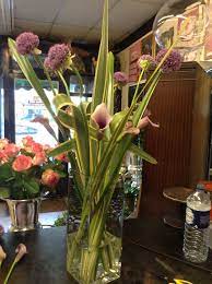 Purple Allium Calla Lily And Phormium Vase Arrangement Corporate Corporate Flowers Floristry Design Floral Arrangements