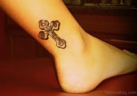 I wonder if the owner of these is a sprinter or some other kind of track simple put this is a lion. 80 Great Cross Tattoos For Ankle