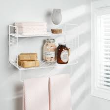 Folding construction for optimal storage when not in use. 2 Tier Wall Mount Bathroom Shelf With Towel Bar