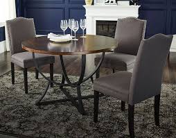 This Is A Great Elegant Dinner Table It Features Dark Metal And Dark Wood Finish To Create The Look Of Luxury Round Dining Table Dark Wood Table Table