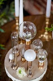 10 Examples Of Cool Edison Bulb Wedding Decor Mywedding Industrial Wedding Centerpieces Cheap Wedding Table Centerpieces Industrial Wedding Decor