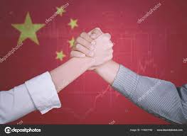 Successful Business Team With China Flag Stock Photo