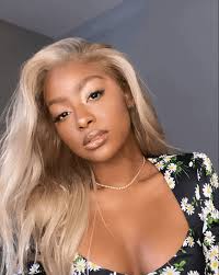 My natural hair color is an almost grey dark blonde (my eyebrows too), but i've been dying my hair for years and it's currently a slightly brassy balayage that's definitely washing me out. 22 Ways To Style Blonde Hair On Dark Skin
