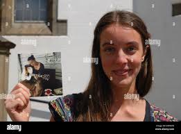 Olivia Fern, folk singer/ songwriter with her album Stock Photo