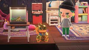 It can be interacted with by pressing a, next to it and facing it, to create a sound that is a mixture of a cat's meow and twinkling. So Proud Of My Lucky Gold Cat Animalcrossing
