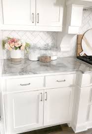 White Kitchen With Gray Marble Counter Top And White Subway Tile Back Splash Whitekitchen Farmhousestyle White Kitchen Design Elegant Kitchens Kitchen Marble