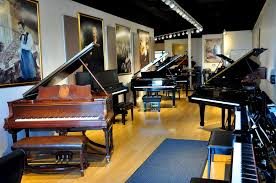 featuring premium pianos from such iconic name brands as bosendorfer yamaha steinway baldwin roland and more our piano store music store design piano pinterest