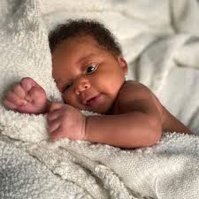 So our plan was to get newborn pictures but between COVID-19 and  Postpartum, this is the best we got. Our newest edition is a month old  today, Noah Alan Strickland 💙. #shotoniphone #