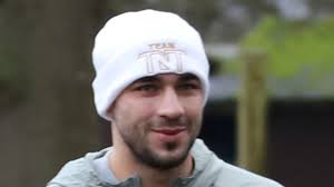 Tommy Fury beams as he's seen for the first time after his snog with  Molly-Mae Hague at Luke Shaw's New Year's Eve party