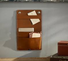 Not only that, leather can contribute to the overall minimalist feel of your room. Leather Wall Hanging Organizer Pottery Barn