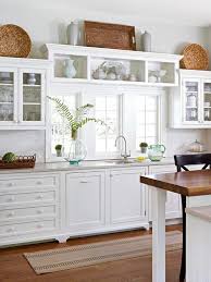 Update Your Kitchen On A Budget Decorating Above Kitchen Cabinets Kitchen Cabinet Design Above Kitchen Cabinets