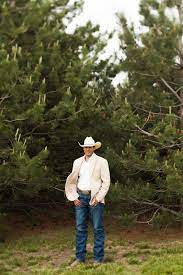 The Groom Starched Jeans Straw Hat And Tan Jacket Country Wedding Groomsmen Country Groomsmen Cowboy Wedding Attire
