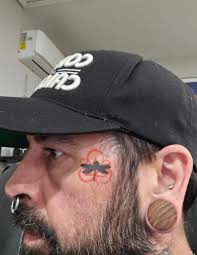 Should I add keWork to the dragonfly tattoo?