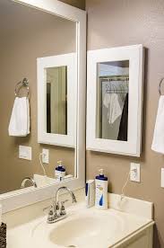 It will come with temporary tape on it. Framing A Boring Medicine Cabinet Bathroom Medicine Cabinet Mirror Old Medicine Cabinets Custom Bathroom Furniture