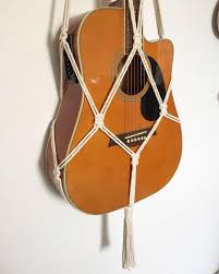 Like i said earlier, i like to either use a hanger hooked onto a door or a nail that is already in the wall. Macrame Guitar Hanger Home Furniture Home Decor On Carousell