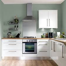 Paint the walls a sage green colour to make the space feel bigger and add darker wooden floor for a rich texture. Pin On Glass Design Kitchen
