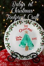Diy Baby S First Christmas Footprint Plate And Mistletoes Craft Baby Christmas Crafts Christmas Footprint Crafts Baby First Christmas Ornament