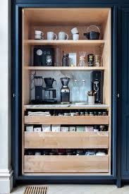 Making coffee off a vintage cabinet coffee bar. 5 Kitchen Coffee Station Ideas To Optimize Your Caffeine Routine