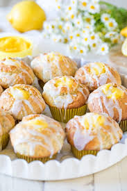 Fluffy Lemon Poppy Seed Muffins Filled With Lemon Curd And Drizzled With A Sweet Lemon Glaze Are Perfect For Lemon Poppyseed Muffins Lemon Curd Lemon Poppyseed