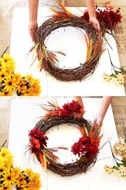 If you are using wire, make sure after you have them secure you tuck the ends back into the grapevine wreath so they don't scratch your door when you hang your wreath. Beautiful Diy Fall Wreath In 10 Minutes So Easy A Piece Of Rainbow