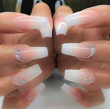 These nails are girly and flirty, which make it the perfect manicure for those who want a more youthful look. 1001 Ideas For Coffin Shaped Nails To Rock This Summer Nails Design With Rhinestones Coffin Shape Nails Nails