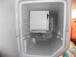 I bought a old used kenmore side by side and the icemaker mold coating is gone. How Do I Remove The Ice Machine Cabinet In A Whirlpool Mfi2269vem2 To Replace The Ice Mold