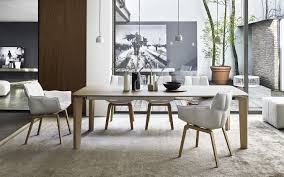 The table's natural stain highlights. Table Oskar B B Italia Design By Vincent Van Duysen