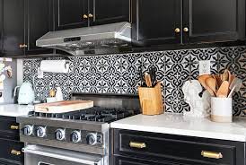 The light shade of grey reinforces the white, natural stone that is used as the kitchen countertop. 40 Brilliant Kitchen Backsplash Tile Ideas For Your Next Reno