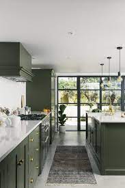 Metal kitchen cabinets are back in style again as a new generation of homeowners are discovering how affordable and low maintenance these cabinets can be. Planning A Kitchen Extension We Ll Take You From A To Z Green Kitchen Cabinets Kitchen Interior Interior Design Kitchen