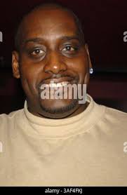 New York Knicks Anthony Mason, left, sticks his tongue out at Chicago Bulls  Will Perdue, right, as Bulls Horace Grant (54) acts as peacemaker during  the fourth quarter of a 100-86 Knicks