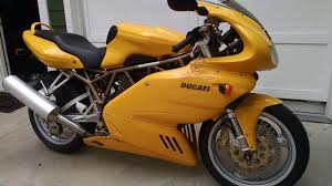 Image result for Nuget Yellow 1999 Motorcycle