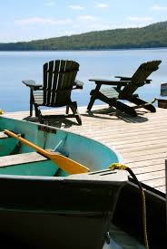 Chairs Boat Dock Paddle Boat And Two Adirondack Wooden Chairs On Dock Facing A Aff Paddle Adirondack Dock Chairs Bo Boat Dock Boat Dock Furniture