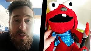 James A Janisse Opens a gift from Benny