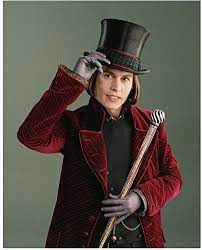 The human chameleon takes on johnny depp! Johnny Depp As Willy Wonka Tipping Top Hat With A Smile 8 X 10 Inch Photo At Amazon S Entertainment Collectibles Store