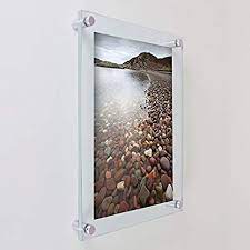 The acrylic feels heavy and substantial and because of the busy nature of the photograph, you don't really notice the glue dots in there. Amazon Com Clear Acrylic Wall Mount Floating Frame For 11 X 17 Poster Photo Graphic Outside Dimension 13 5 X 19 5 Made In The Usa