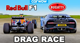 So, the method is car wrapping or car advertisng. Bugatti Chiron Vs Red Bull F1 Car Who S Quickest Down A Quarter Mile Carscoops