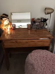 My Old Wooden Desk Turned Into A Small Makeup Vanity I Also Bought The Seat Cover From 5 And Below Wooden Makeup Vanity Makeup Vanity Lighting Makeup Vanity