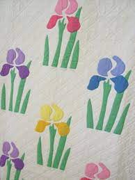 Iris Quilt Block Showing The Pattern And Some Colors Applique Quilts Flower Quilts Floral Quilt