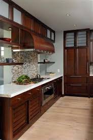 Choosing the right laminate floor can truly make your oak cabinets shine and give you the look you seek. Walnut Cabinets And Wood Floors Pictures Please