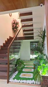 Bungalow interior with bold designs | 9degree design studio. Bungalow Shadab Anwari Associates Modern Corridor Hallway Stairs Homify Courtyard Design Home Stairs Design Staircase Design Modern