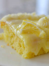In the bowl of a mixer, mix the cake mix, eggs, water, oil and jello together. Lemon Pudding Poke Cake Small Town Woman