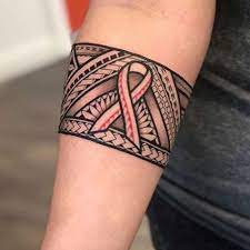 Elegant yellow blue black and red color ink tribal butterfly with colorful breast cancer tattoo on back for girls. The 32 Best Breast Cancer Tattoos Ideas Photos