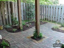 This Paver Patio Was Installed Beneath A Deck In A Townhome Back Yard Small Backyard Landscaping Backyard Patio Large Backyard Landscaping
