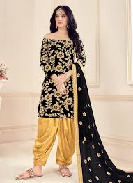 Here in this attire, the plain black kurti is teamed up with full ghera patiala salwar. Popular Black Plain Salwar Kameez And Black Plain Salwar Suits Online Shopping