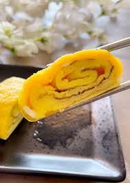 Japanese zenzai is an unusual dessert which combines thick red bean soup with mochi, the famous sticky rice cake. Tamagoyaki Japanese Sweet Rolled Egg Omelette Nomlist