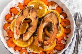 Wigilia is the polish name for christmas eve. Fried Carp Fish Slices With Carrot And Oranges Traditional Polish Stock Photo Picture And Royalty Free Image Image 133903662