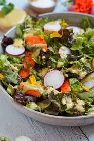 I keep seeing and hearing this joke that white people put raisens in their potato salad and i've legit never come across this abomination. Red Leaf Lettuce Salad With Raisins Walnuts And Curry Tahini Dressing Nikki Vegan